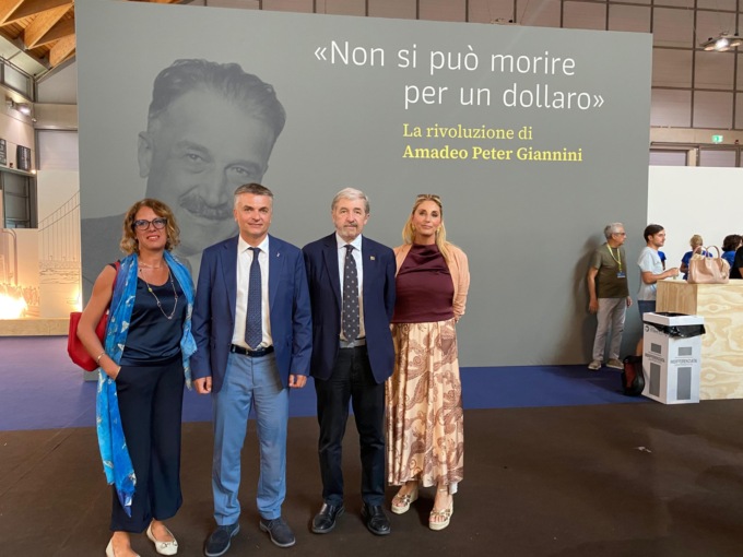 Il presidente Bucci al Meeting di Rimini alla mostra dedicata ad Amadeo Peter Giannini
